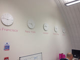 Clock Names for international business. Office fit out graphics