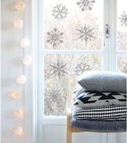 Removable frosted Christmas window decorations
